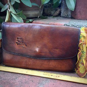 Vintage leather rose clutch